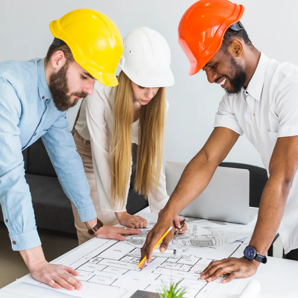 group architect discussing layout plan blueprint office